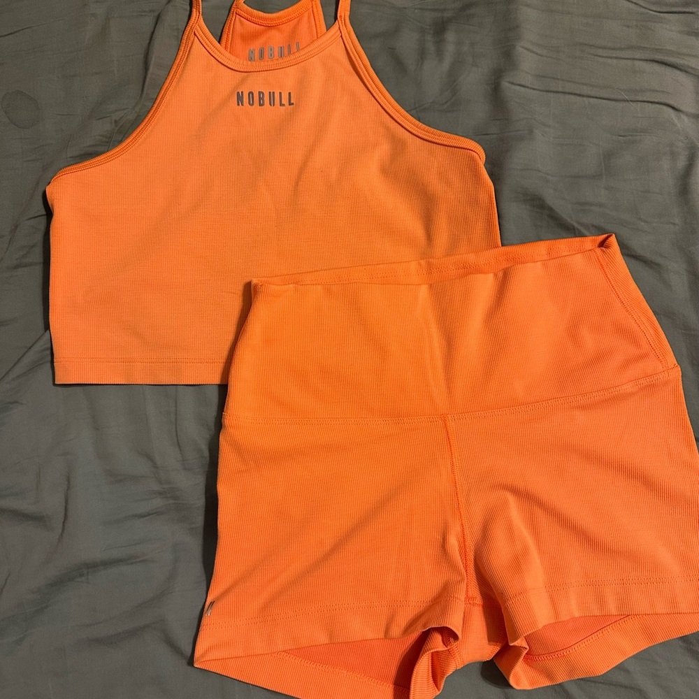 NOBULL Women's Bright Orange Athletic Shorts and tank top